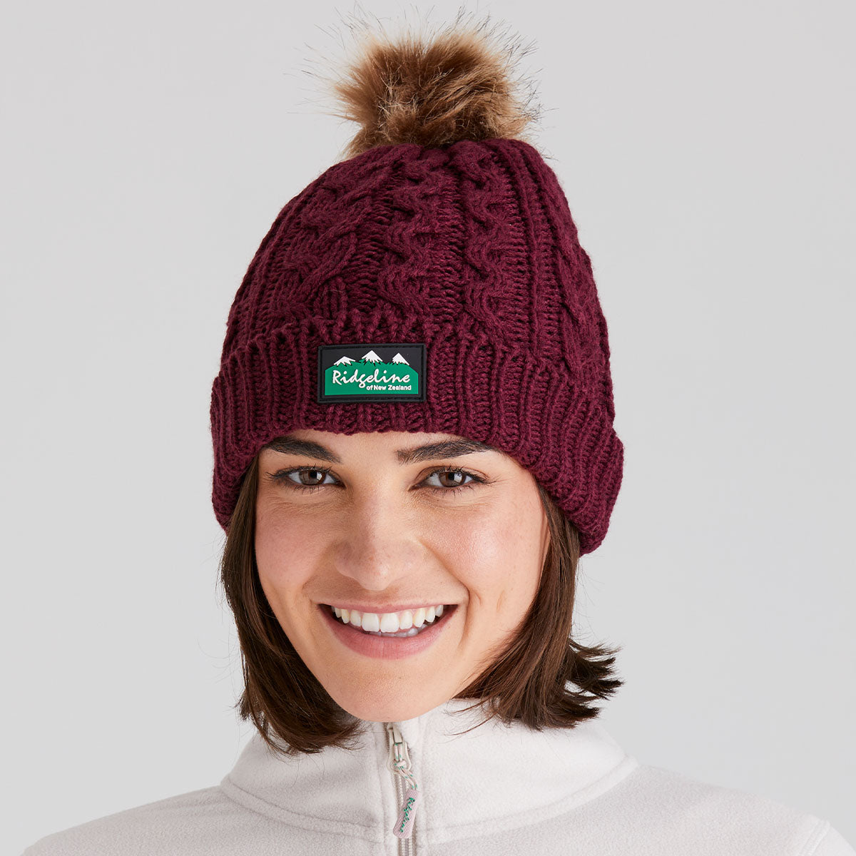 Ridgeline Nordic Fleck Bobble Hat #colour_winter-berry